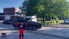 Watch this teen roll up to prom in a tank