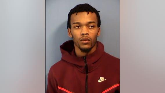 Oswego man arrested after police find automatic machine gun in vehicle