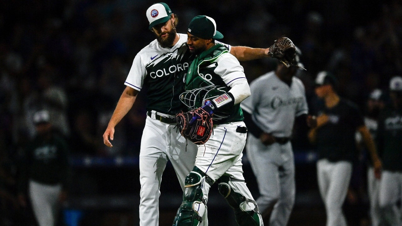 Elias Diaz of the Colorado Rockies celebrates with Brendan Rodgers News  Photo - Getty Images