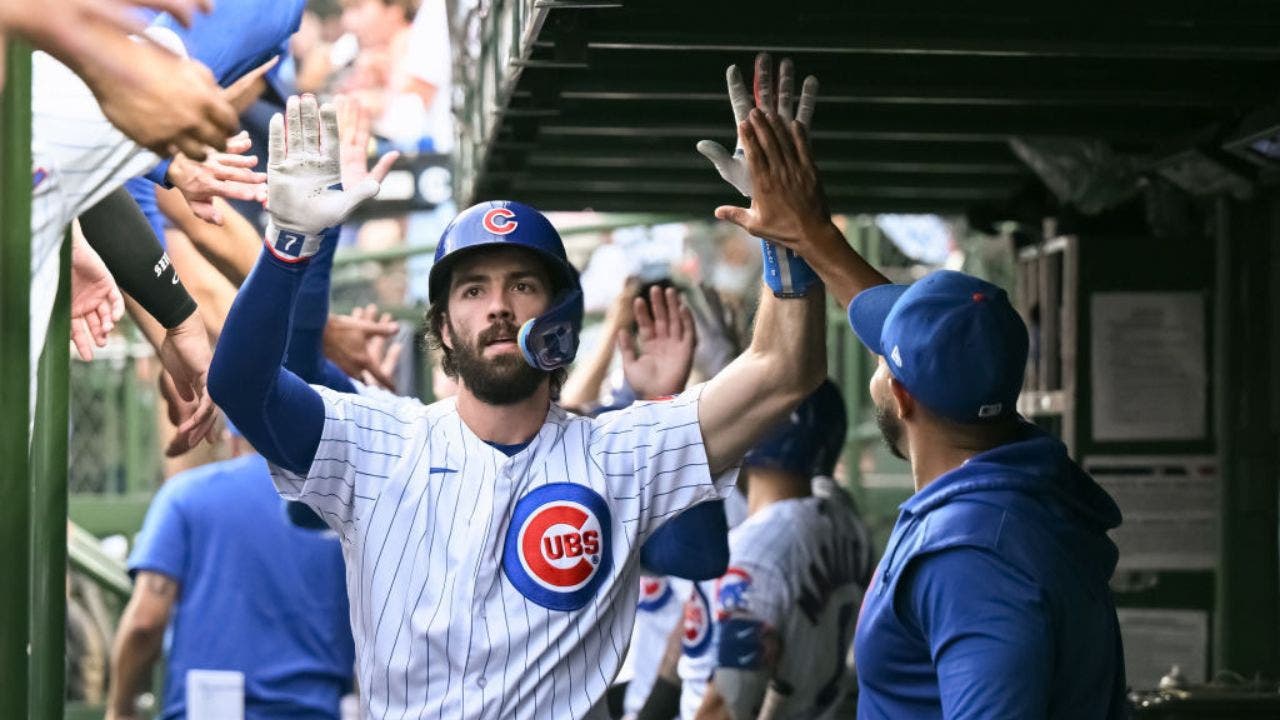 Dansby Swanson homers twice as Chicago Cubs pound Cincinnati Reds 20-9