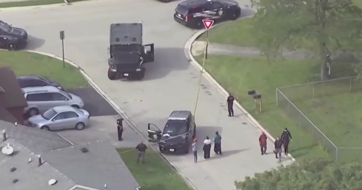 Shooting suspect arrested after 2 suburban schools put on lockdown ...