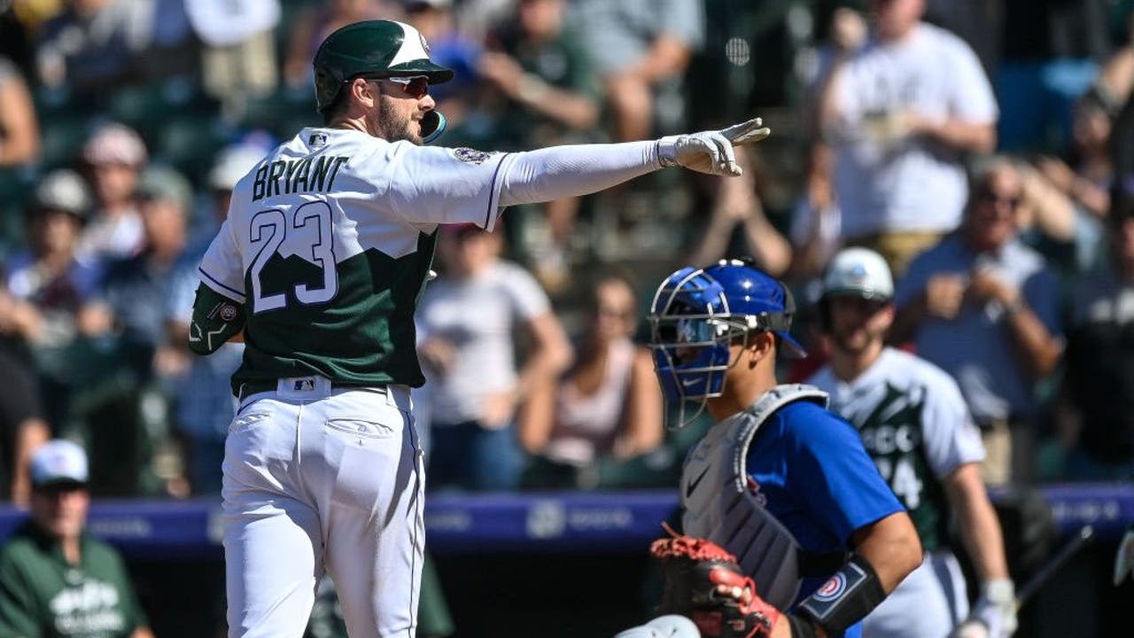 Kris Bryant hits one of the Rockies' four homers in a 7-3 win over