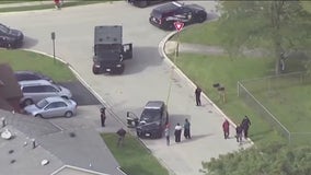 Shooting suspect arrested after 2 suburban schools put on lockdown