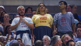 Watch: Police remove climate protesters from US Open after 50-minute delay