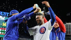 Canario's grand slam helps Cubs rout Pirates 14-1 to open half-game lead for last wild card
