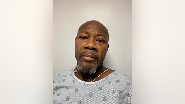 Man accused of tying up suburban jewelry store employees during armed robbery