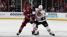 Carcone scores 3 times as Coyotes pound Blackhawks 8-1