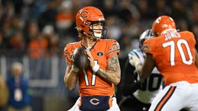 Foreman runs for TD, Bears beat Panthers 16-13 to boost their shot at the top pick in the draft