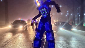 Dancing holiday robot surprises visitors at Aurora Festival of Lights