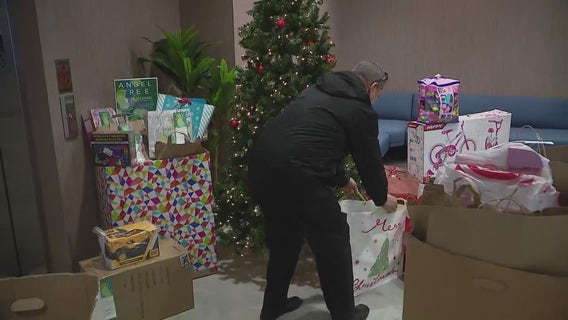 Elves from the Salvation Army collecting donations for annual 'Angel Tree' program