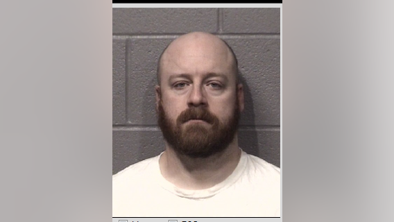 Elgin cop facing child pornography charges resigns