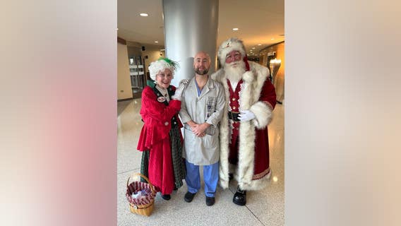 Home for the holidays: Santa Claus visits care team who saved his life