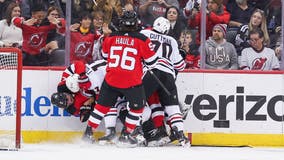 Connor Bedard departs after big hit as Chicago Blackhawks lose 4-2 to New Jersey Devils