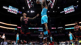 Coby White scores 27 as Bulls hold on to beat Hornets 119-112 in OT