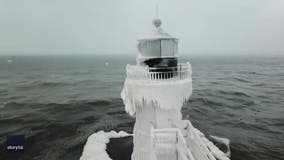 Historic lighthouses on Lake Michigan covered in ice