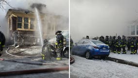 Chicago firefighters battle blaze at Grand Crossing home