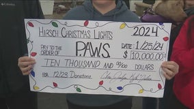 Tinley Park family raises $10K in donations for P.A.W.S. through holiday decorations