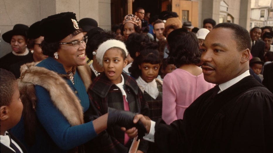 Dr.-King-greets-parishioners.jpg