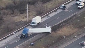 Semi rolls over on I-80 in Will County leaving 1 injured