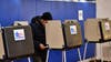 Chicagoans brave rain, long lines to vote on Election Day