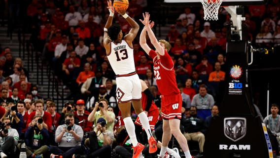 No. 13 Illinois takes Big Ten title with 93-87 win over Wisconsin