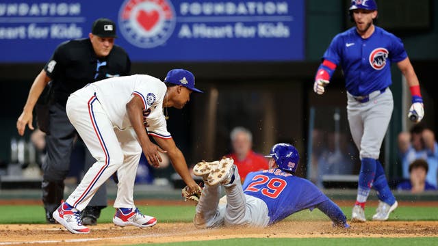 Rangers overcome disputed tip, Steele leaves with injury as Cubs fall 4-3 10th-innings