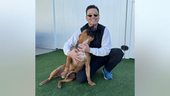 FOX 32's Scott Schneider cages himself for West Suburban Humane Society fundraiser