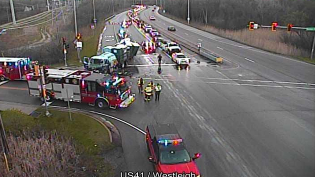 School bus crashes into truck carrying porta-potties in Lake Forest