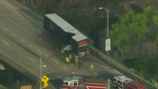 Semi catches fire on I-80, stalling rush hour traffic
