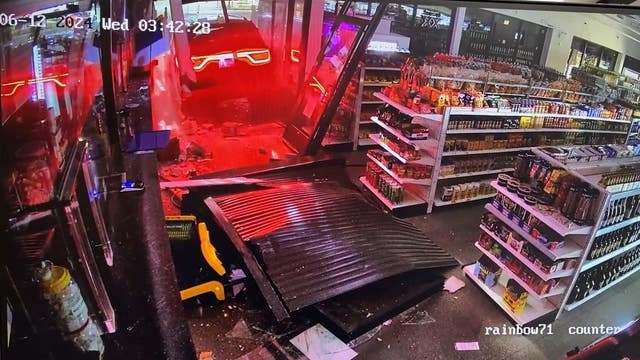 Video shows thieves grab armfuls of alcohol after backing SUV into South Side store