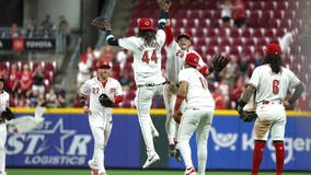 Santiago Espinal homers to extend hit streak to 10 games, Reds' bullpen holds on to beat Cubs 6-3