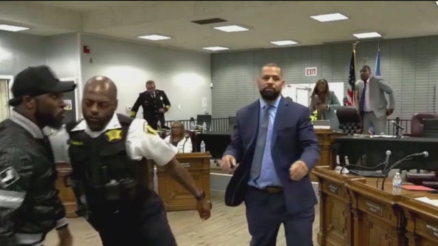 Dolton meeting gets tense as activist Jedidiah Brown calls out Andrew Holmes over sexual assault allegations