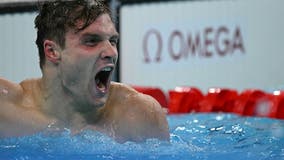 American Bobby Finke sets 1,500 freestyle world record on final night of Olympic swimming