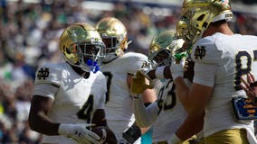 No. 12 Notre Dame knocks error-prone No. 24 Navy from unbeaten ranks