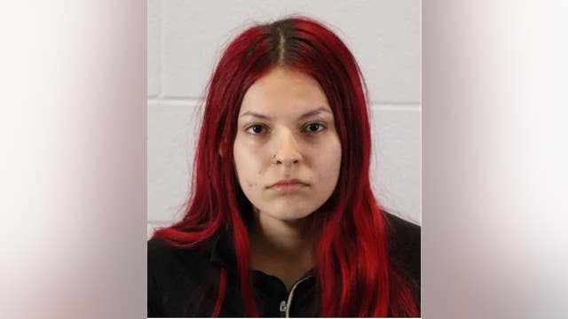 Aurora woman charged in fatal street racing crash