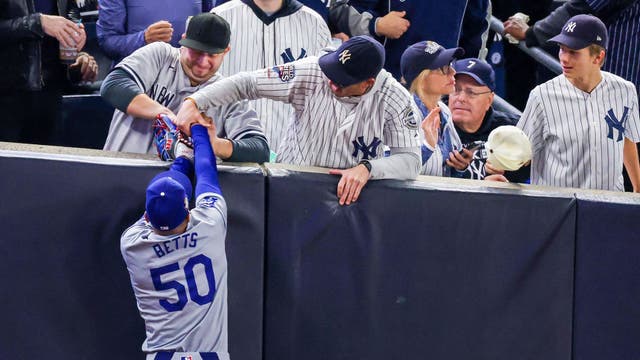 Yankees fans who interfered with Mookie Betts during World Series banned from all MLB games