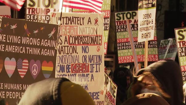 Hundreds march in protest after Trump sworn in as president again