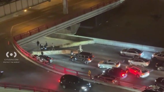 Kennedy Expressway traffic stalled after steel poles fall off semi, blocking roadway