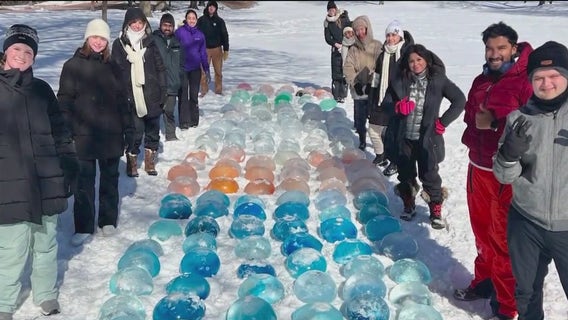 Illinois Institute of Technology students build 12-foot colorful ice tower on campus