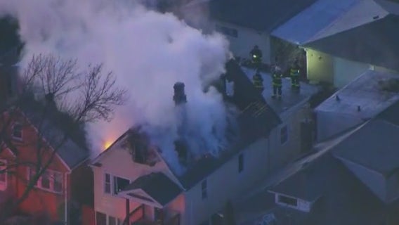 Extra-alarm fire tears through homes on Chicago's NW Side
