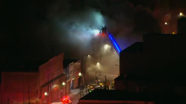 Firefighter injured in massive blaze at South Side furniture store