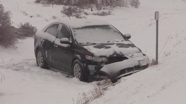 Skokie residents clean up remnants from yesterday's snowstorm