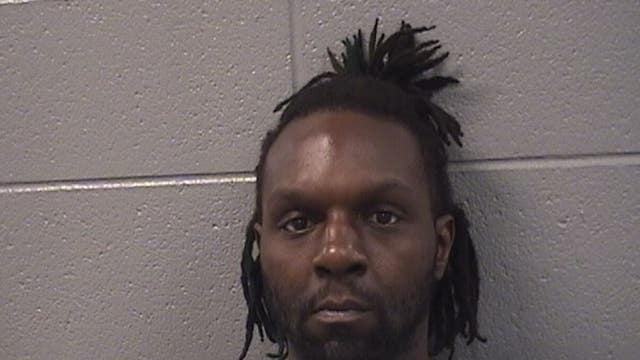 Chicago father arrested after 8-year-old son fatally shot; postal worker performed CPR: court docs