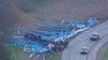 Truck carrying metal tubes overturns on Route 53 ramp