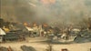 Massive fire breaks out at Joliet area facility; firefighter hurt in roof collapse