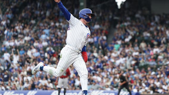 Tucker hits 2-run HR, Cubs score 6 in 8th after giving up 10 in top half to beat Diamondbacks 13-11