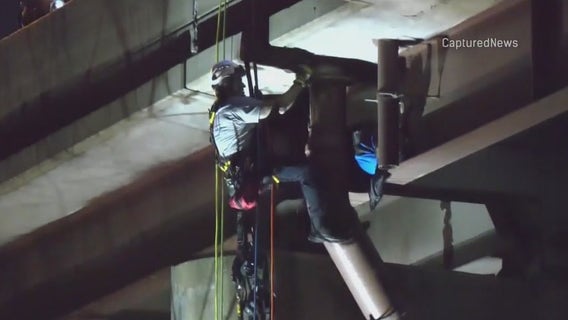 Man rescued after clinging to I-57 structure following crash, police pursuit