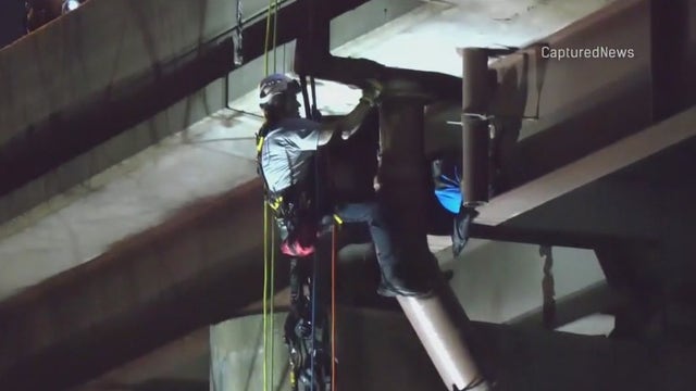 Man rescued after clinging to I-57 structure following crash, police pursuit