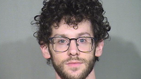 Ex-Chicago area HS wrestling coach charged with child porn possession: records