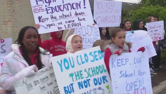 Students, families rally against Catholic school closure in Prospect Heights